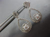 ESTATE .80CT DIAMOND 14KT WHITE GOLD SOLITAIRE INFINITY FLOWER HANGING EARRINGS