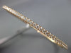 ESTATE .58CT ROUND DIAMOND 18KT ROSE GOLD CLASSIC SEMI ETERNITY BANGLE BRACELET