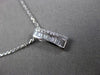 ESTATE .20CT BAGUTTE & ROUND DIAMOND 14K WHITE GOLD RECTANGULAR FLOATING PENDANT