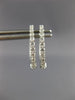 ESTATE .25CT DIAMOND 14KT WHITE GOLD 3D CLASSIC OVAL HUGGIE HOOP EARRINGS