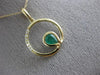 ESTATE .03CT DIAMOND & AAA EMERALD 14KT YELLOW GOLD CIRCLE OF LIFE FUN PENDANT