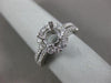 ESTATE .69CT DIAMOND 14KT WHITE GOLD FOUR PRONG HALO SEMI MOUNT ENGAGEMENT RING