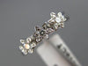 ESTATE .15CT DIAMOND 18KT WHITE GOLD STAR FLOWER PAST PRESENT FUTURE RING #11635