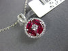 ESTATE .94CT ROUND DIAMOND & AAA RUBY 18KT WHITE GOLD CIRCULAR FLOATING PENDANT
