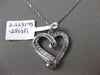 ESTATE .29CT ROUND & BAGUETTE DIAMOND 14K WHITE GOLD FLOATING LOVE HEART PENDANT