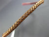 ESTATE .27CT DIAMOND 14KT WHITE & ROSE GOLD X LOVE WAVE FLEXIBLE BANGLE BRACELET