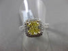 ESTATE 2.26CTW GIA FANCY YELLOW DIAMOND 18KT WHITE GOLD HALO ENGAGEMENT RING