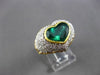 ANTIQUE PLATINUM & 18KT Y GOLD 4.55CT DIAMOND & EMERALD HEART ENGAGEMENT RING