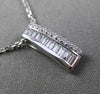 ESTATE .20CT BAGUTTE & ROUND DIAMOND 14K WHITE GOLD RECTANGULAR FLOATING PENDANT