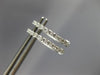 ESTATE .25CT DIAMOND 14KT WHITE GOLD 3D CLASSIC OVAL HUGGIE HOOP EARRINGS