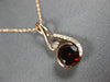 ESTATE 1.08CT DIAMOND & AAA GARNET 14KT ROSE GOLD 3D LOVE KNOT INFINITY PENDANT
