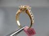 ESTATE LARGE 1.13CT ROUND & BAGUETTE DIAMOND 18KT ROSE GOLD HALO ENGAGEMENT RING