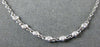 ESTATE .07CT DIAMOND 18KT WHITE GOLD CLASSIC BY THE YARD BEZEL 7 STONE NECKLACE