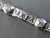 ESTATE 1.07CT DIAMOND 14KT WHITE GOLD HEXAGON ROMAN NUMERAL LOVE TENNIS BRACELET