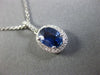 ESTATE 1.21CT DIAMOND & AAA SAPPHIRE 14KT WHITE GOLD OVAL HALO FLOATING PENDANT