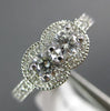 ESTATE .80CT DIAMOND 14KT WHITE GOLD TWO STONE SEMI ETERNITY FILIGREE LOVE RING