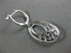 ESTATE .75CT ROUND AND BAGUETTE DIAMOND 14KT WHITE GOLD 3D OVAL HANGING EARRINGS