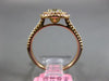 ESTATE .71CT WHITE & FANCY YELLOW DIAMOND 18KT YELLOW GOLD HALO ENGAGEMENT RING