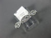 ESTATE .50CT DIAMOND 14KT WHITE GOLD 3D INFINITY 3/4TH ETERNITY ANNIVERSARY RING