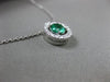 ESTATE .41CT DIAMOND & EMERALD 18KT WHITE GOLD CLASSIC HALO FLOATING PENDANT E/F