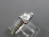 ESTATE .66CT ROUND & PRINCESS DIAMOND 14KT WHITE GOLD SOLITAIRE ENGAGEMENT RING