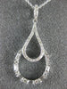 ESTATE .46CT ROUND & BAGUETTE DIAMOND 14KT WHITE GOLD TEAR DROP FLOATING PENDANT