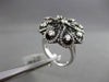 ANTIQUE LARGE 1.14CT DIAMOND 18KT WHITE & BLACK GOLD ETOILE FLOWER FUN RING