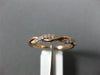 ESTATE .15CT DIAMOND 14K ROSE GOLD SWIRL INFINITY SEMI ETERNITY ANNIVERSARY RING