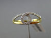 ESTATE .15CT DIAMOND 18KT WHITE & YELLOW GOLD 3D SEMI INFINITY LOVE KNOT RING