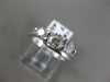 ESTATE .91CT DIAMOND 14KT WHITE GOLD 3D PAST PRESENT FUTURE TENSION RING #14161