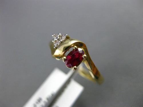 ESTATE .40CT DIAMOND & AAA RUBY 14KT WHITE & YELLOW GOLD 3D INFINITY LOVE RING