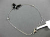 ESTATE WIDE .09CT DIAMOND & BLACK ONYX 18K WHITE GOLD CLASSIC BUTTERFLY BRACELET