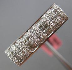 ESTATE .60CT ROUND & PRINCESS DIAMOND 18KT WHITE GOLD RECTANGULAR INVISIBLE RING