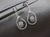 ANTIQUE .25CT DIAMOND 14KT WHITE GOLD FLOATING SWIRL DROP HANGING EARRINGS