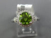 ESTATE 1.51CT DIAMOND & PERIDOT 14KT WHITE GOLD 3D ROUND HALO FRIEDNSHIP RING