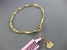 ESTATE .12CT DIAMOND 14KT TWO TONE GOLD 3D SQUARE HEART FLEXIBLE SWIRL BRACELET