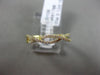 ESTATE .12CT DIAMOND 18KT YELLOW GOLD 3D DOUBLE ROW INFINITY WAVE LOVE RING