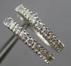 ESTATE .29CT ROUND DIAMOND 14KT WHITE GOLD 3D CLASSIC OVAL LOVE HUGGIE EARRINGS
