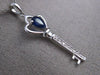 ESTATE .45CT DIAMOND & SAPPHIRE 14KT WHITE GOLD KEY TO MY HEART FLOATING PENDANT