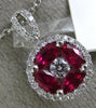 ESTATE .94CT ROUND DIAMOND & AAA RUBY 18KT WHITE GOLD CIRCULAR FLOATING PENDANT