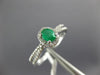 ESTATE .54CT DIAMOND & AAA EMERALD 14KT WHITE GOLD 3D OVAL HALO FRIENDSHIP RING