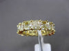 ESTATE LARGE 7.50CT FANCY DIAMOND 18KT YELLOW GOLD EMERALD CUT ETERNITY RING