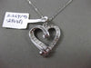 ESTATE .29CT ROUND & BAGUETTE DIAMOND 14K WHITE GOLD FLOATING LOVE HEART PENDANT