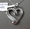 ESTATE .29CT ROUND & BAGUETTE DIAMOND 14K WHITE GOLD FLOATING LOVE HEART PENDANT