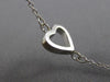 ESTATE LONG TIFFANY & CO. 18K WHITE & YELLOW GOLD FLOATING HEART BRACELET #23095
