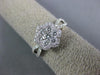 ESTATE .94CT ROUND DIAMOND 18KT WHITE GOLD 3D CLASSIC FLOWER CLUSTER LOVE RING