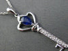 ESTATE .45CT DIAMOND & SAPPHIRE 14KT WHITE GOLD KEY TO MY HEART FLOATING PENDANT