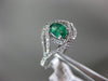 ESTATE WIDE .81CT DIAMOND & AAA EMERALD 14KT WHITE GOLD INFINITY ENGAGEMENT RING