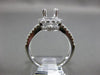 ESTATE .69CT DIAMOND 14KT WHITE GOLD FOUR PRONG HALO SEMI MOUNT ENGAGEMENT RING