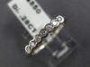 ESTATE .28CT DIAMOND 18KT WHITE GOLD SEMI BEZEL 7 STONE ANNIVERSARY RING #4434